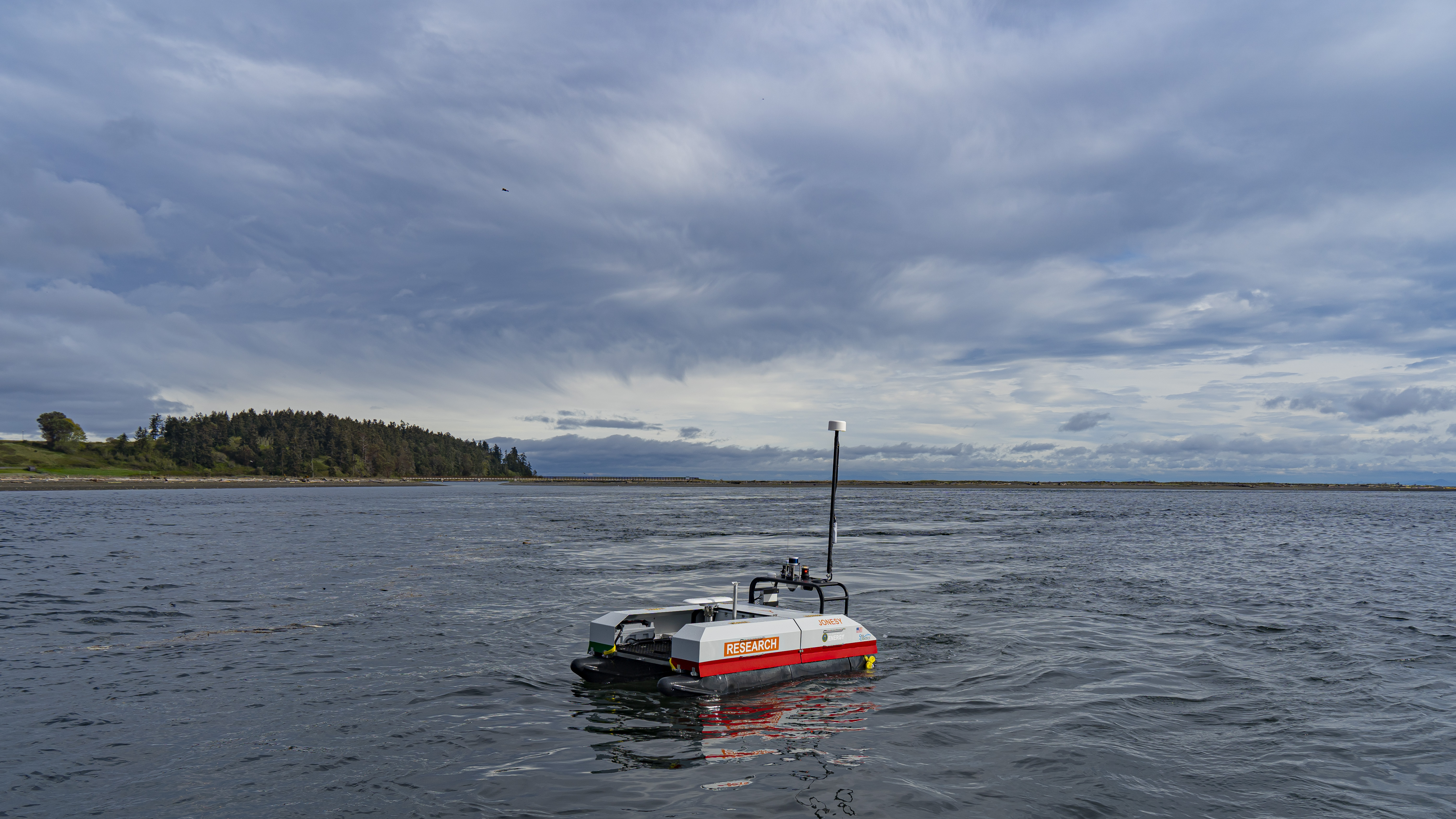 An autonomous surface vehicle floats on Sequim Bay.