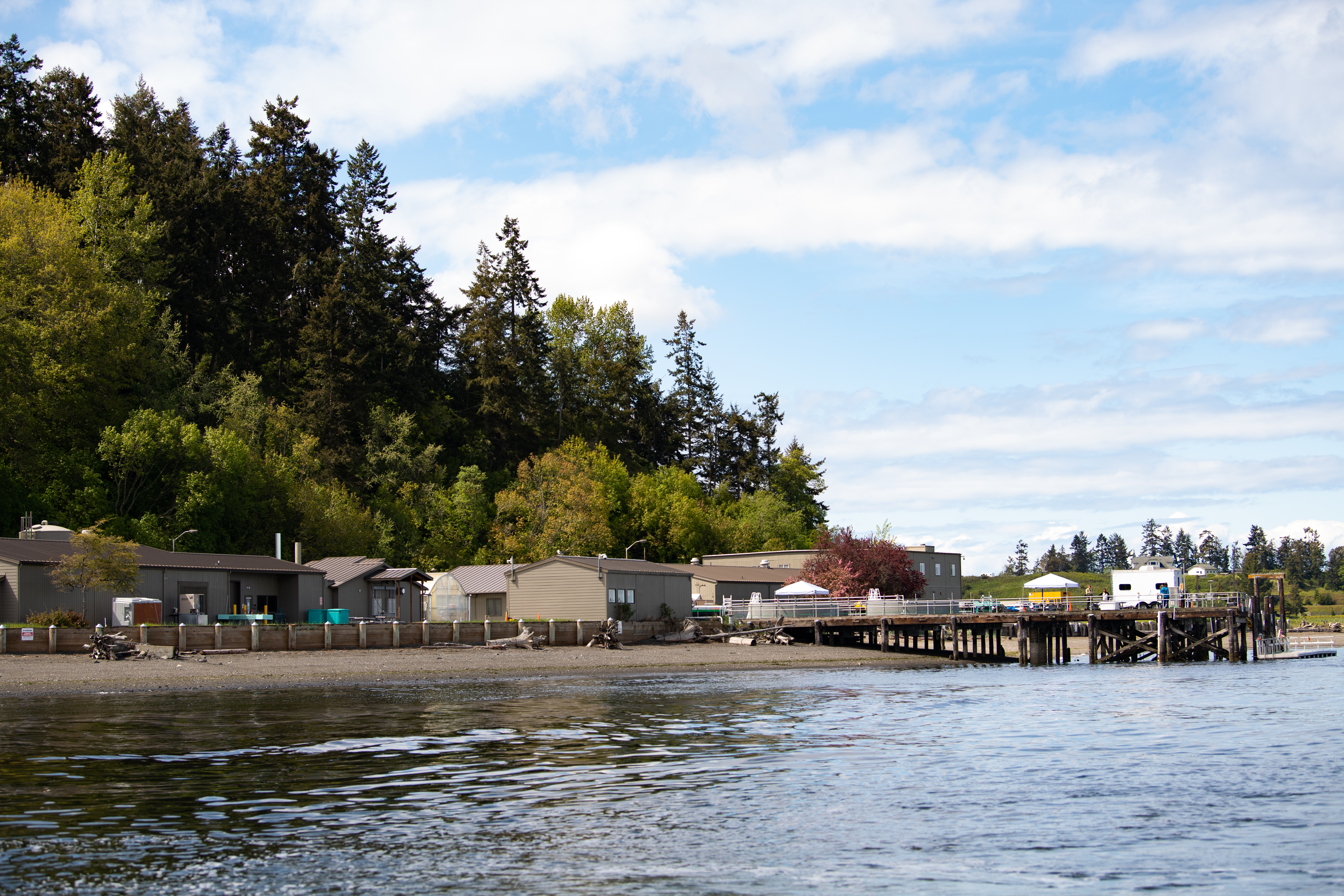 Photograph of PNNL-Sequim campus showing the coastline and buildings