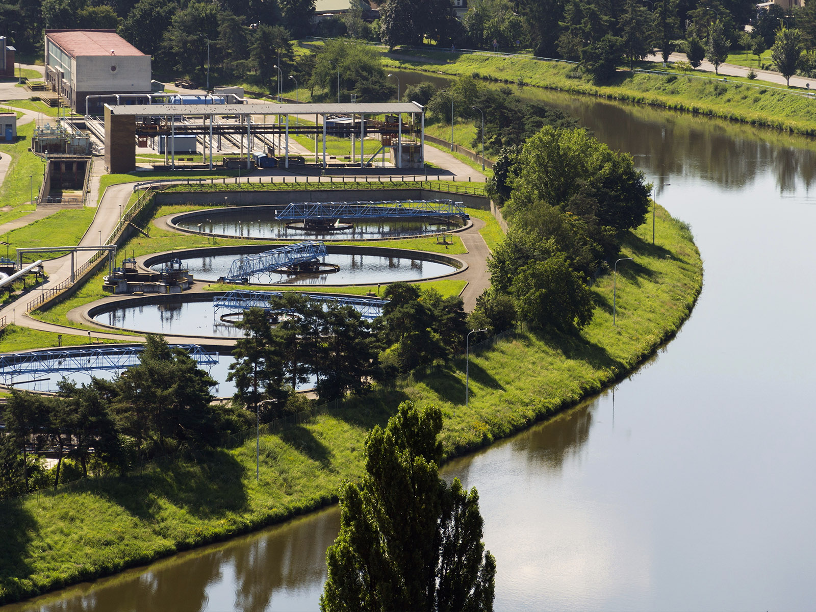 Photograph of a water treatment plant on a river
