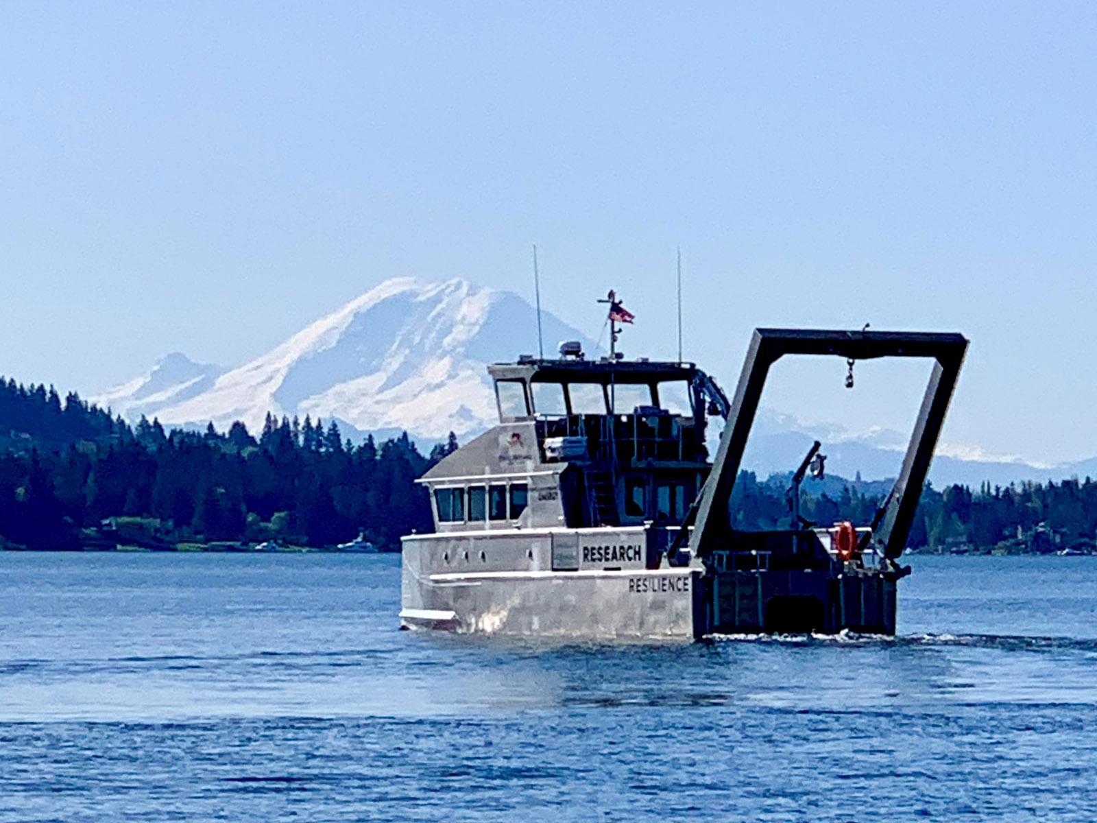 RV Resilience cruises with Mt Rainier in the background.