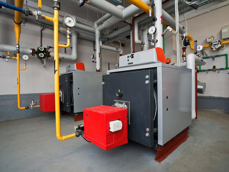 Boilers similar to these heat buildings nationwide. DOE has published a rule for boilers that will lead to efficiency gains for units sold and installed in the United States. (Photo by EvijaF | Shutterstock)