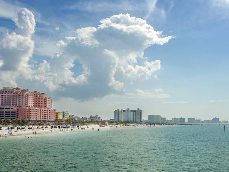 View of ocean along Clearwater Beach with hotels and buildings along the shoreline 