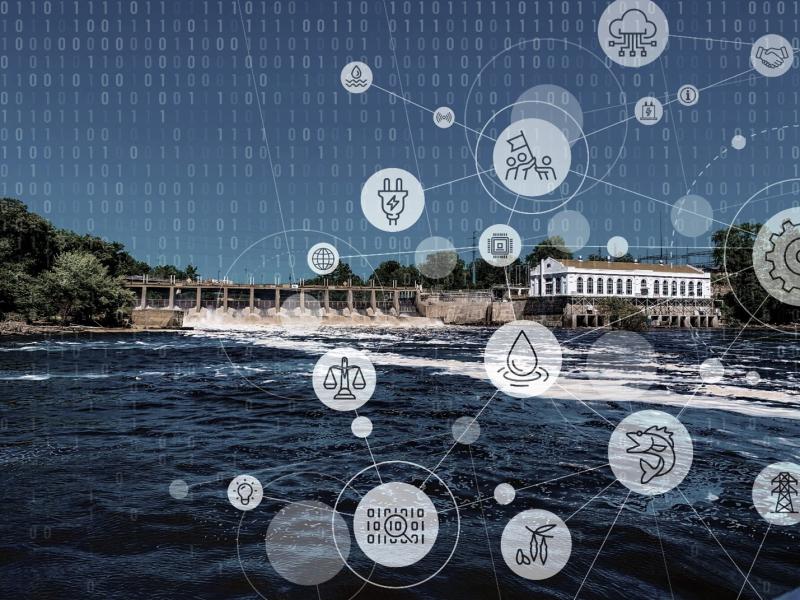 Photo of hydropower with data icons overlaying it