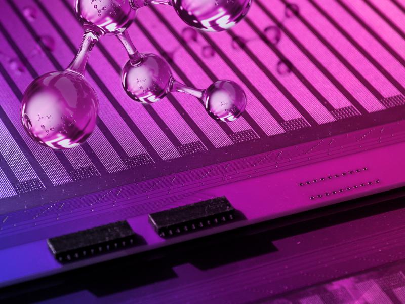 purple background of circuit board with glass molecule in foreground