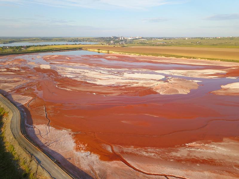 Photograph of red mud waste, a byproduct of aluminum production