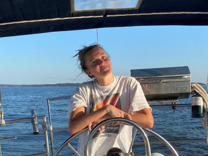 Christen Hvidsten smiling from a boat 