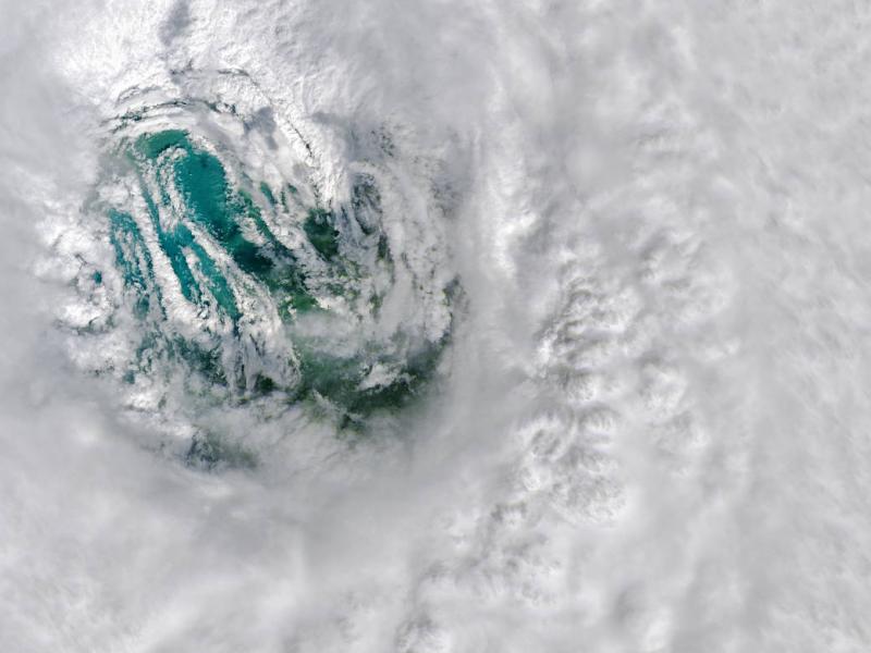 This image depicts the eye of Hurricane Ian. Thick, spinning thunderstorm clouds encircle and form the eye of the storm.