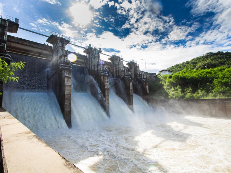 Dam with open floodgates